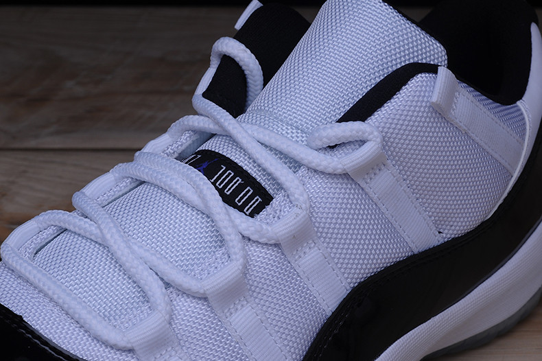 AIR JORDAN 11 RETRO LOW "CONCORD" BLACK/ WHITE mens 528895-153
